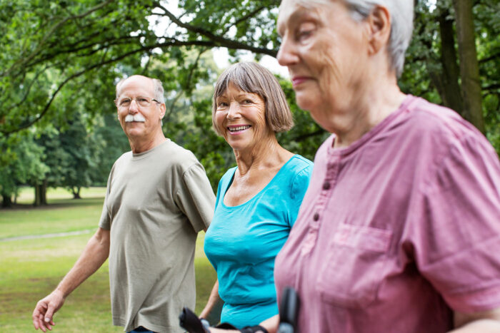 senior living residents walking together