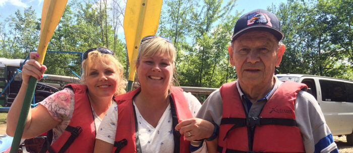 senior living residents going canoeing