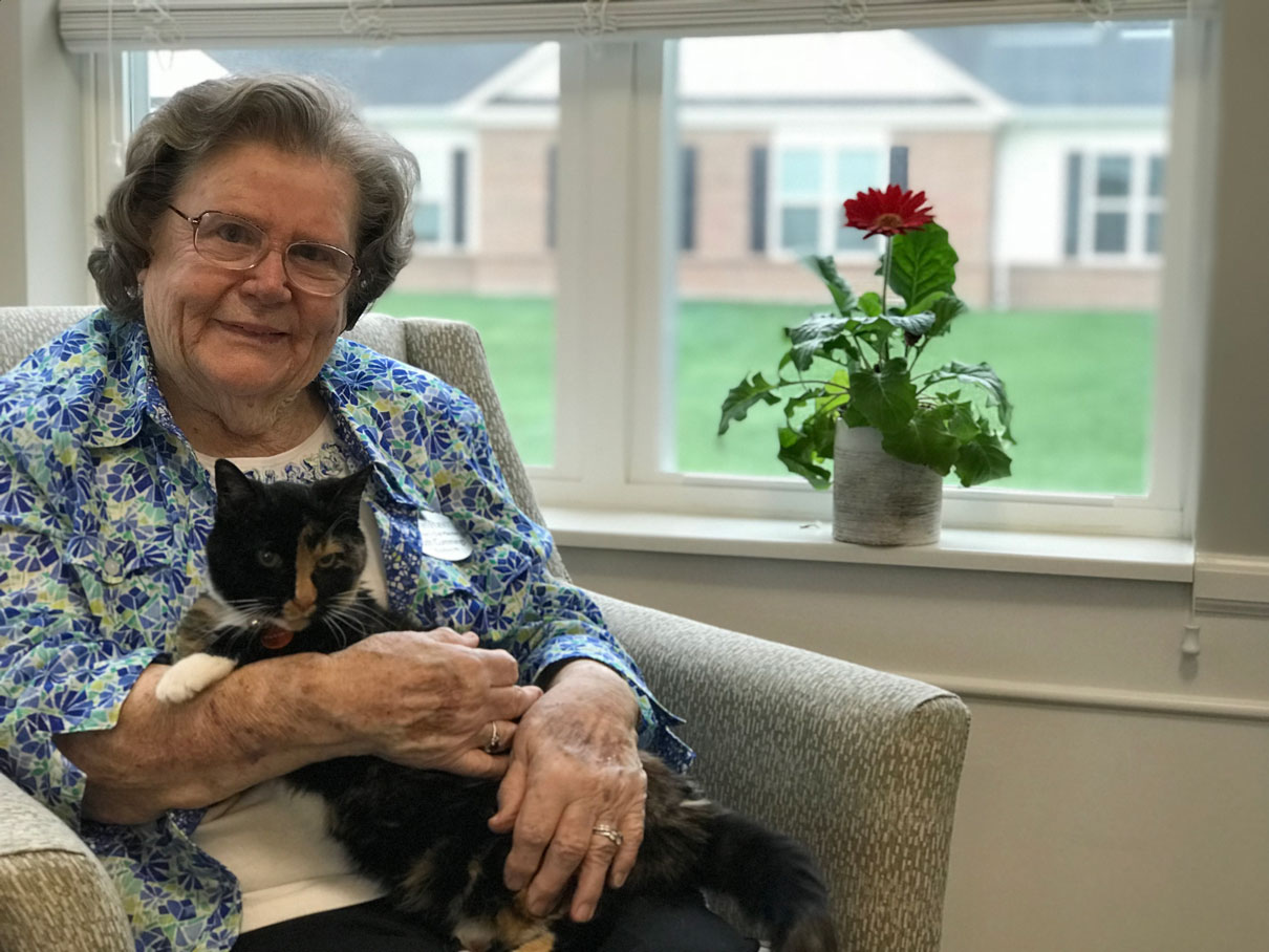 StoryPoint resident Marcia and her cat Muffin