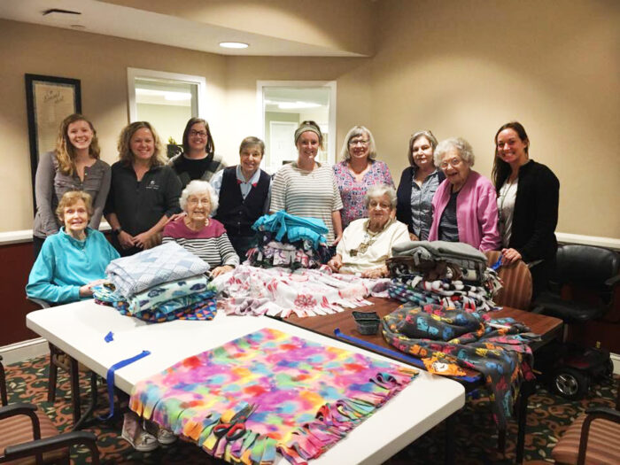Independence Village residents making blankets for Project Linus