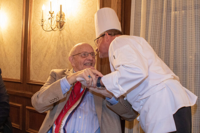chef shaking hands with a resident