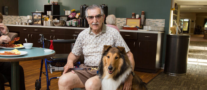 StoryPoint senior living resident with his pet