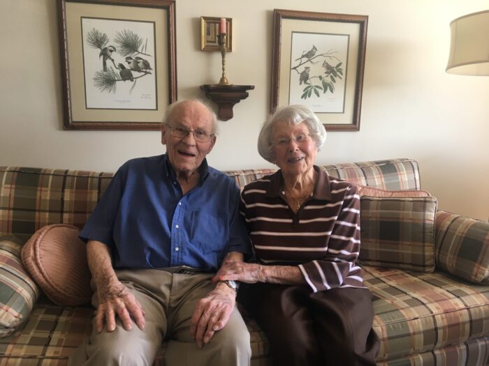 Independence Village couple sitting on the couch