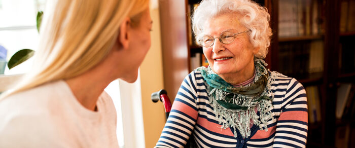 senior and her daughter having a conversation