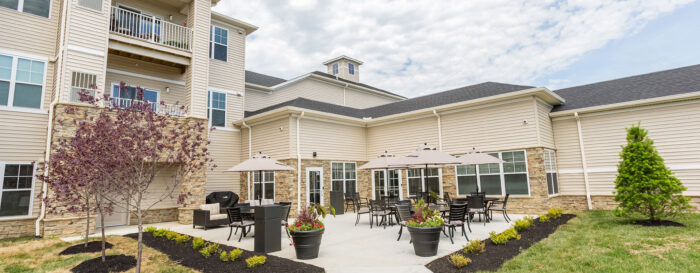 StoryPoint patio with furniture and umbrellas