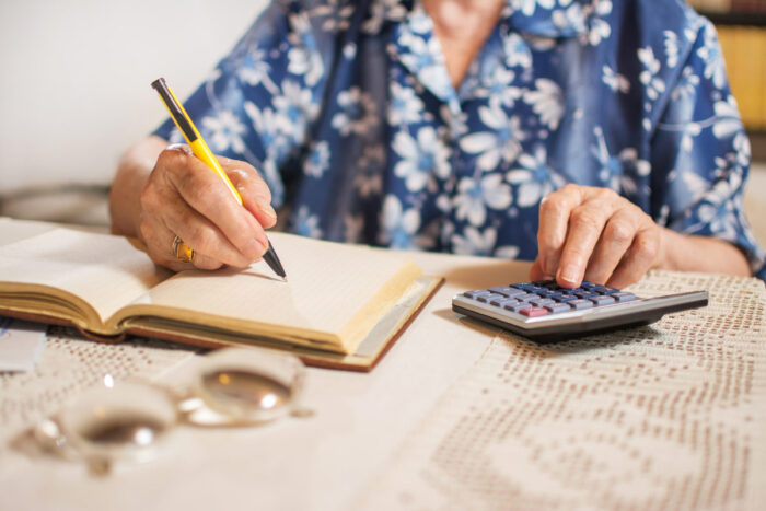 woman writing in a notebook