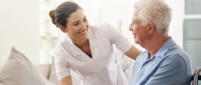 caregiver talking with a senior