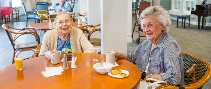 StoryPoint senior women smiling dining