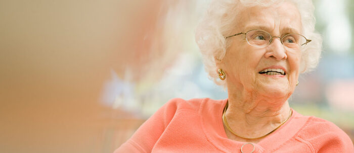 senior woman smiling while relaxing