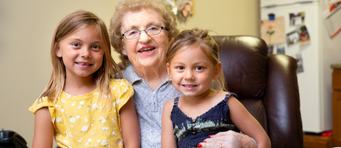 senior woman grandparent grandkids smiling