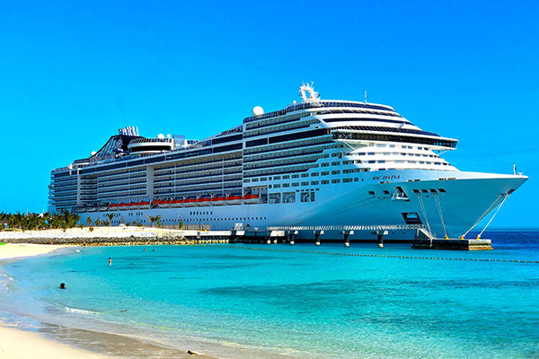 a cruise ship on a blue ocean