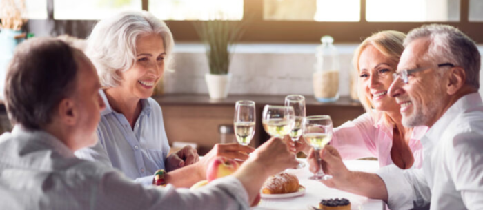 a group of seniors having drinks