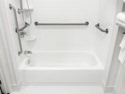 bathroom bathtub with grab bars