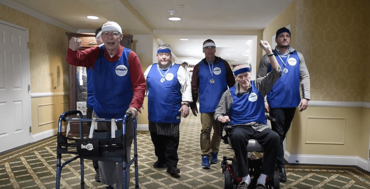 independence village of Plymouth residents walking to video shoot for cookie madness