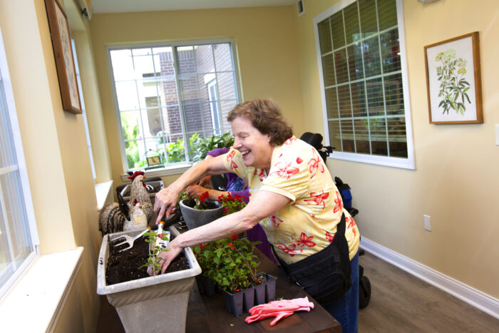 StoryPoint resident gardening indoors