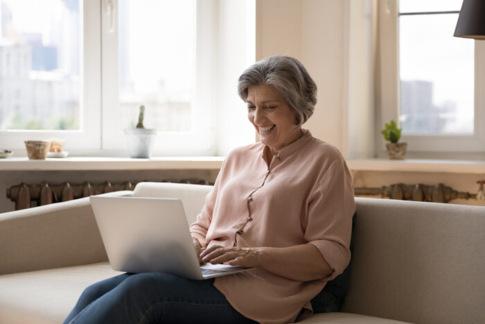 senior on her laptop 