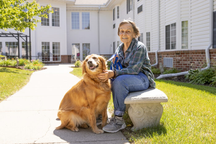 StoryPoint resident outside with her dog