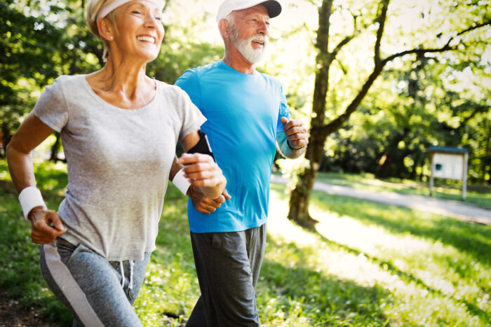 couple of senior adults jogging