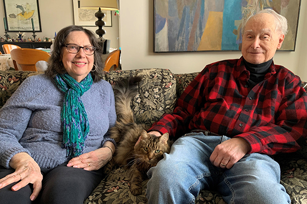 residents Carol and Norman with their cat