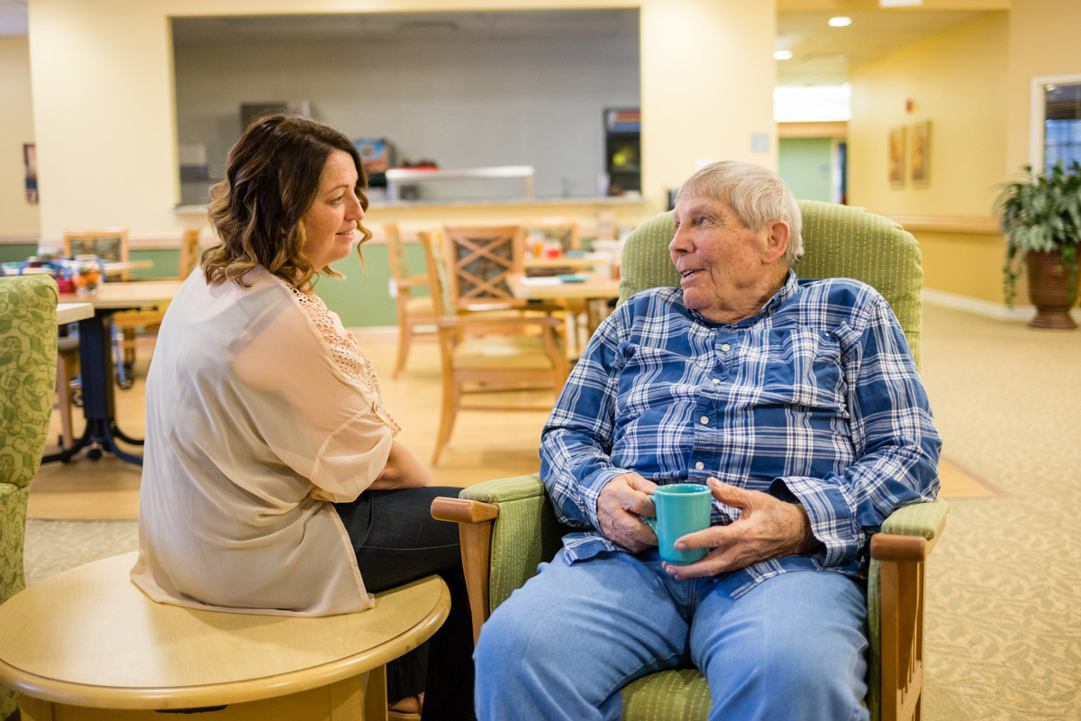 StoryPoint resident talking to a caregiver