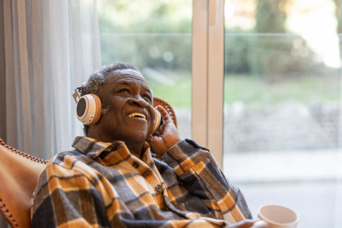 senior man listening to music