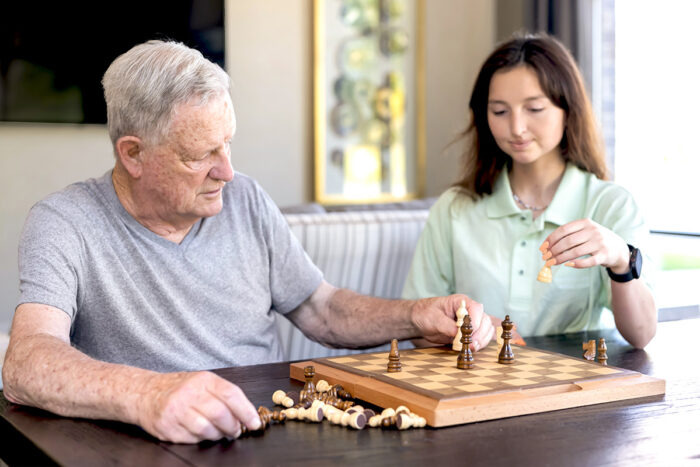 StoryPoint residents playing chess