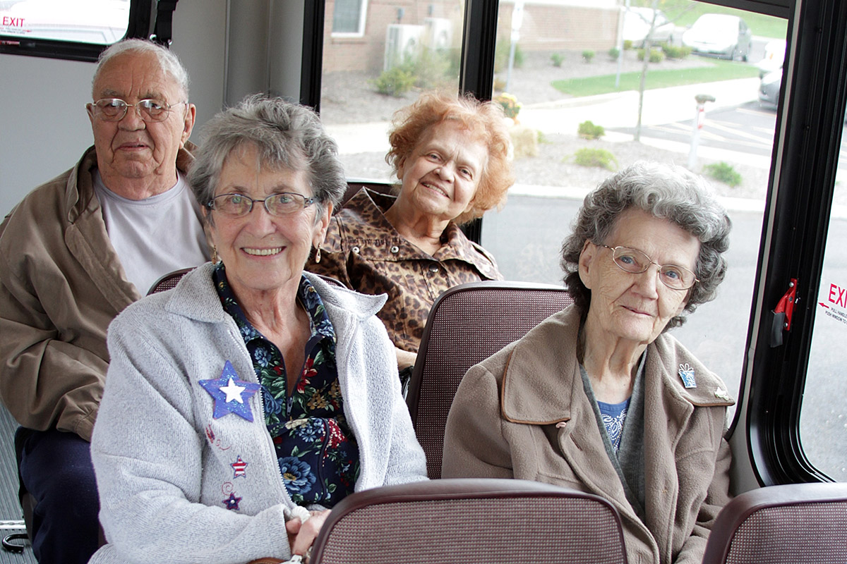StoryPoint Senior living residents on a bus