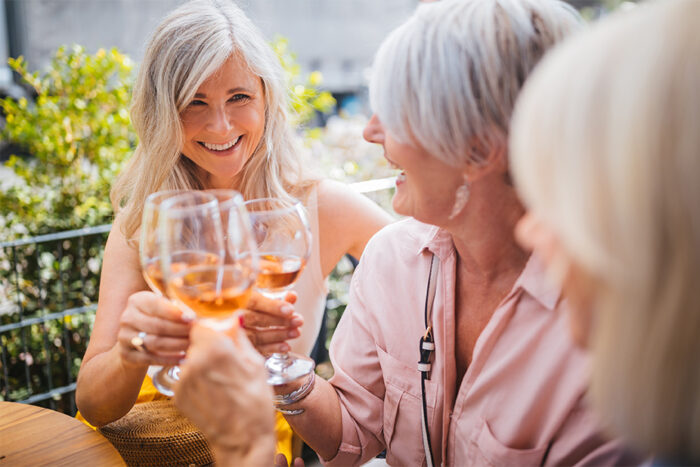 seniors drinking wine