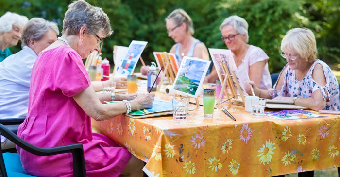 residents painting outside