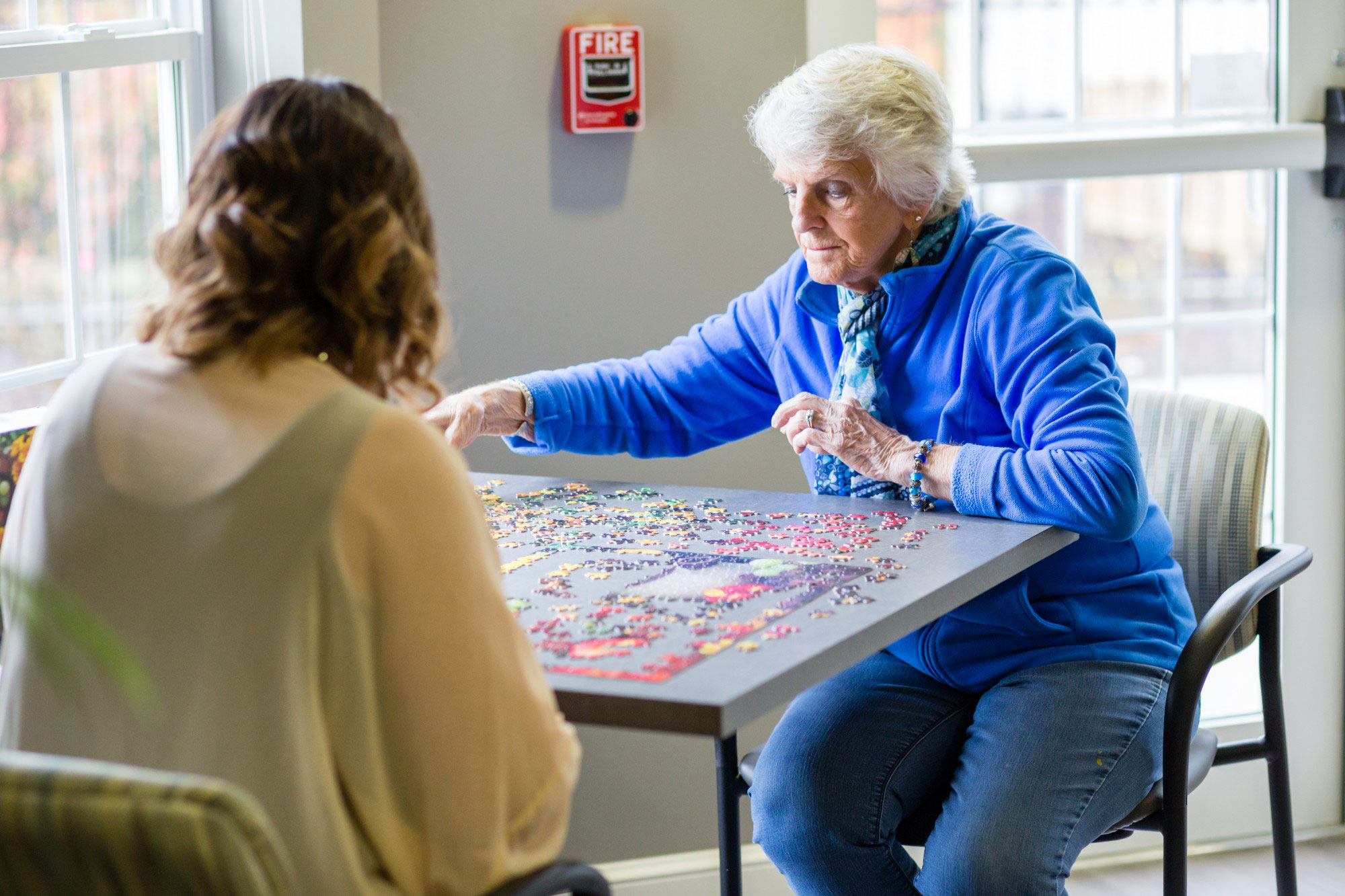 StoryPoint resident solving a puzzle