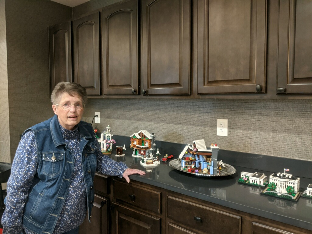 StoryPoint Group resident showing off lego sets