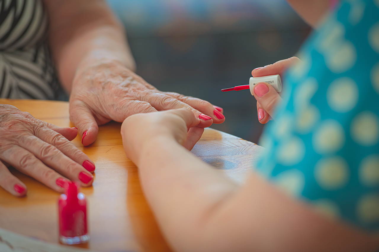 senior getting their nails painted