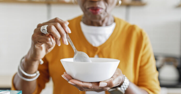 woman editing fortified cereal