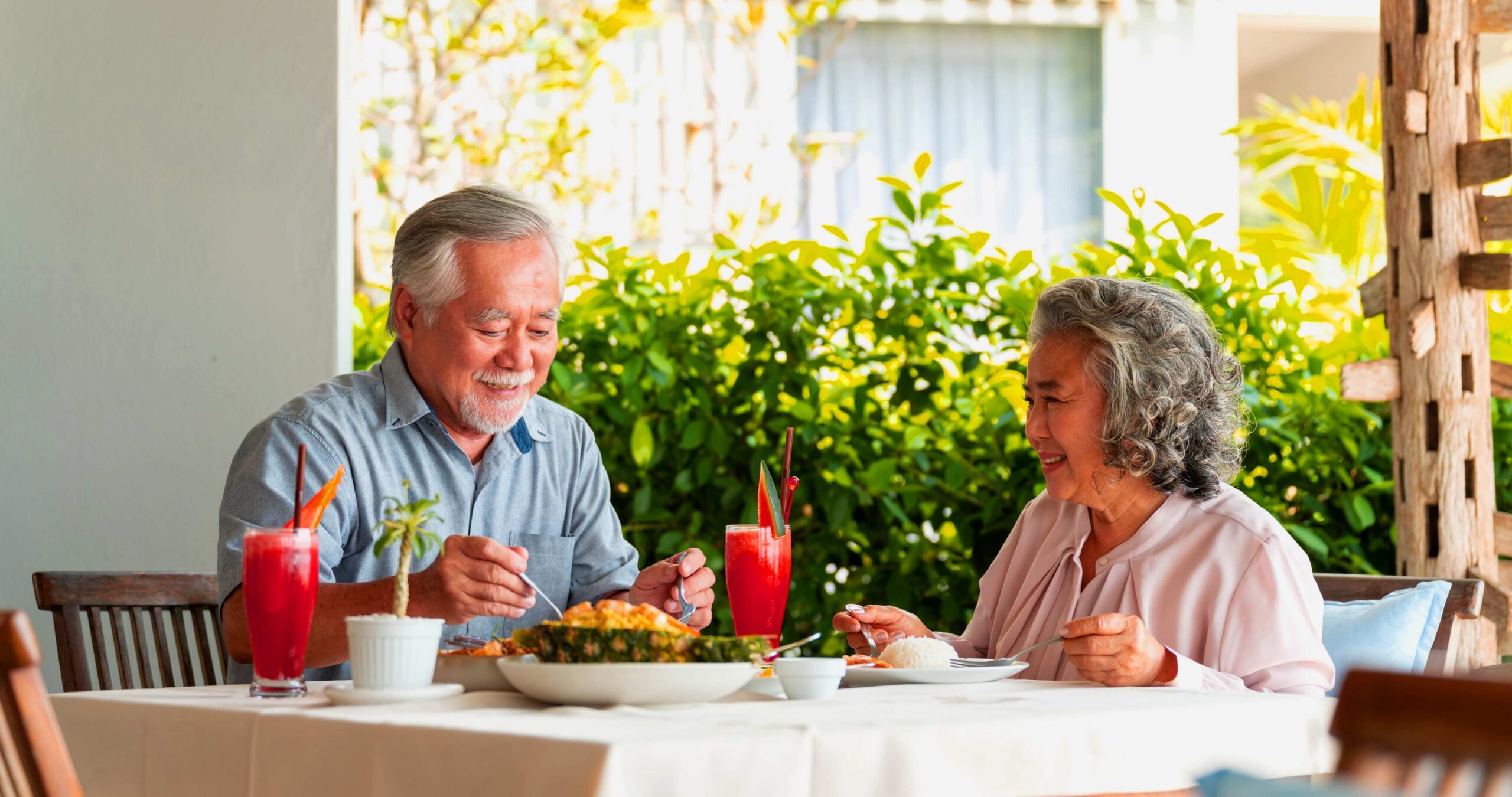 senior couple eating a meal together